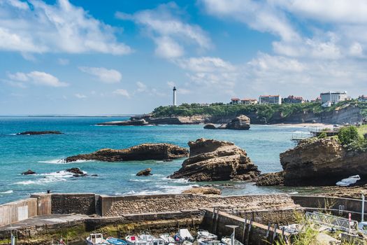 City of Biarritz with its lighthouse and these typical houses and old port in France