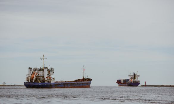 Transport vessels depart from the port in Swinoujscie to the open Baltic Sea