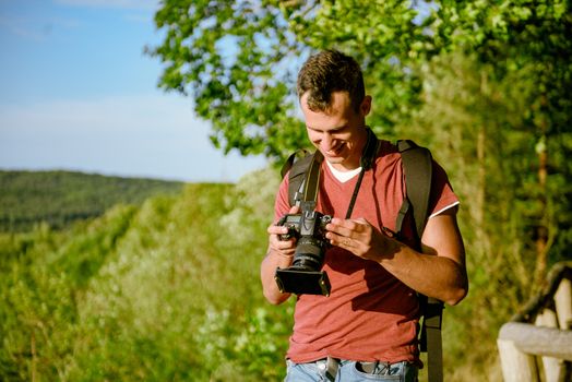 Photographer's boyfriend takes a photo. Summer season. Nature and landscape photography