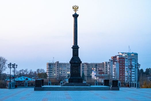 Komsomolskaya square of Khabarovsk at night by the light of lanterns.