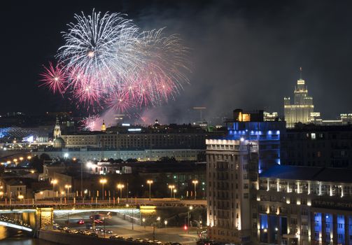 Russia,  Moscow,  view on the city center at night. Fireworks explosions in the night sky.