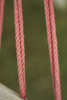 Macro shot detail of a trailing rope ready to hold its weight. Vertical shooting.