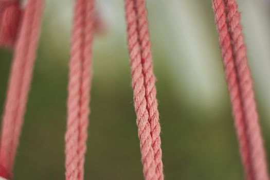 Macro shot detail of a trailing rope ready to hold its weight. Horizontal shooting.