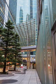 Modern architecture. Passage between steel and glass skyscrapers. Minato City, Tokyo.