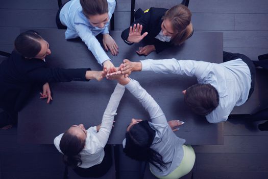 People with their hands together. Business team work concept
