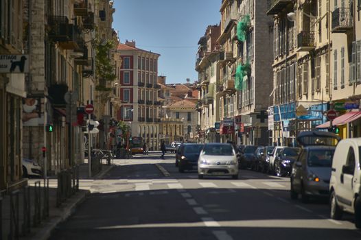 Scene of daily life in one of the most beautiful and suggestive streets of Nice in France.