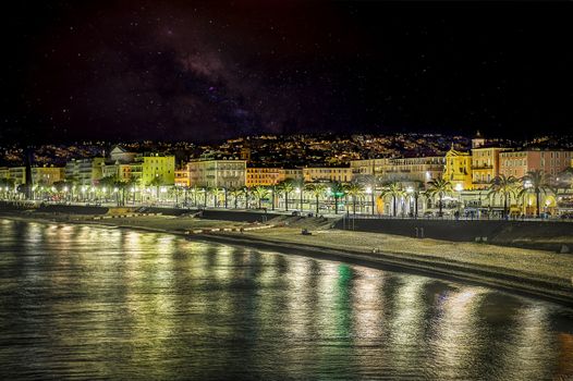 Breathtaking view of Nice Beach at the promenade, in night vision.