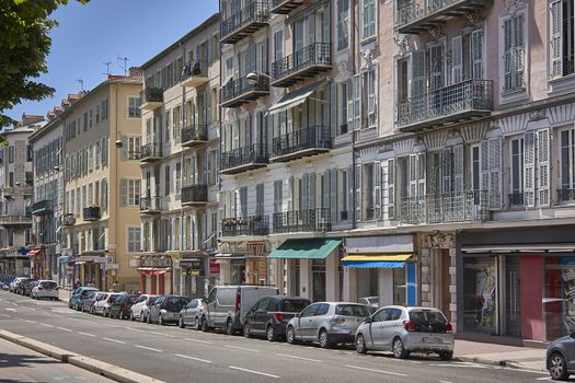 Scene of daily life in one of the most beautiful and suggestive streets of Nice in France.