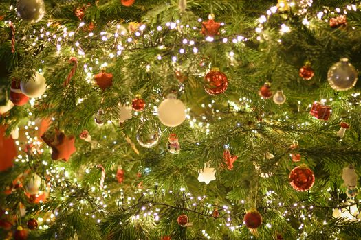 Closeup of Christmas-tree decorations shiny light