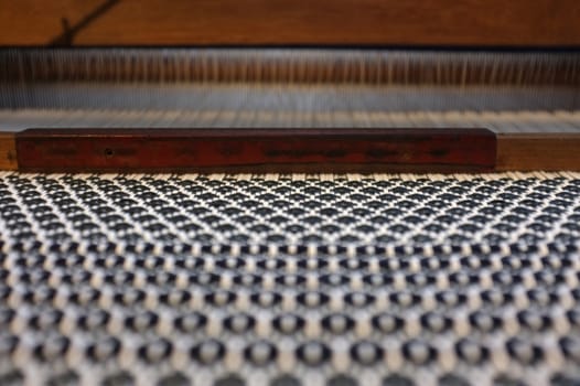 Close up Important tools used in weaving are called loom , Concept Weaving traditional thai fabric