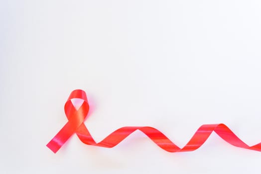 Red Ribbon Support HIV, AIDS on white background and copy space for use