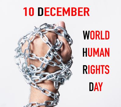 Chained fist hands with 10 DECEMBER WORLD HUMAN RIGHTS DAY text on white background, Human rights day concept