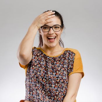 Portrait of woman making a happy face