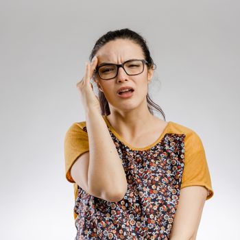 Cute Portrait of a woman worried with something