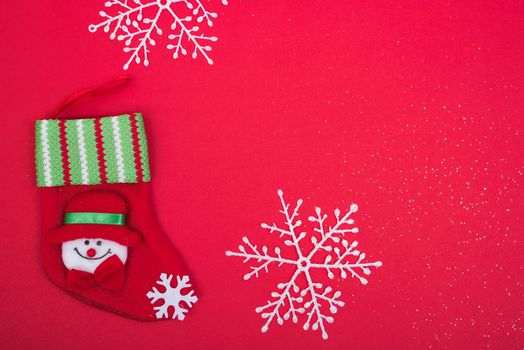 Stocking decoration in christmas holiday on red background