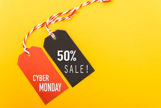 Internet online shopping, Promotion Cyber Monday Sale text on red tag and 50% sale text on black tag with yellow background