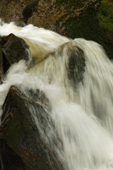 Beautiful view of Potoka Falls in super green forest surroundings, Czech Republic