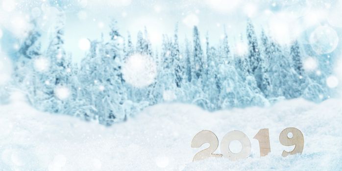 2020 New Year in snow design concept. Wooden 2020 New Year horizontal template with blue and white bokeh background and fir forest