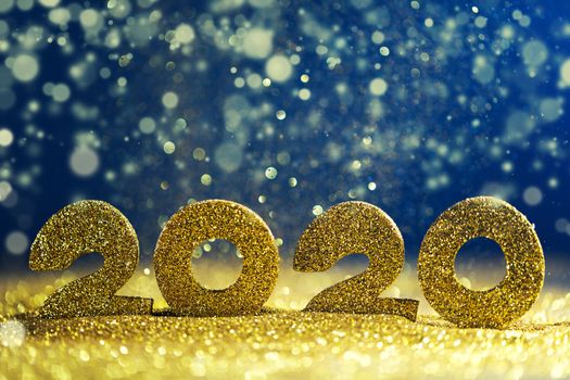 2020 New Year luxury design concept. Golden 2020 New Year horizontal template with golden glitter on blue backgound