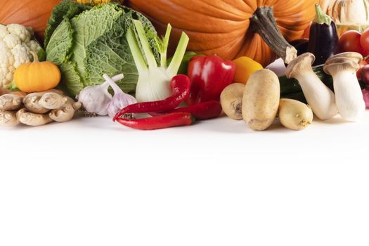 Harvest of many vegetables isolated on white background border frame with copy space for text