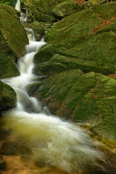 Beautiful view of Nisy Falls in super green forest surroundings, Czech Republic