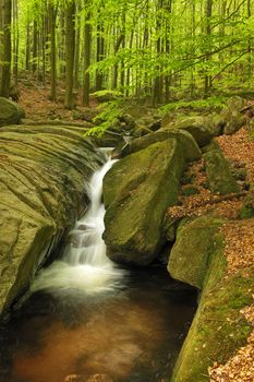 Beautiful view of Velky Falls in super green forest surroundings, Czech Republic