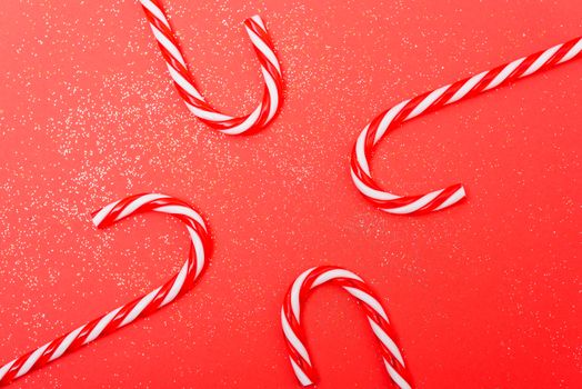 New Year, Christmas Xmas candy canes double border on red background