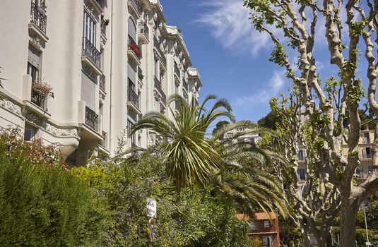 Typical nice building, nestled in the greenery of the surrounding vegetation.