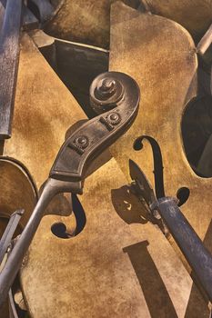 Macro detail of some pieces of vintage violins, a set of pieces of old violins placed in such a way as to create a pleasant composition.
