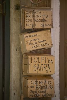 Wooden baskets used as insignia in a typical Italian hamlet: here you live as once respecting the ancient traditions.