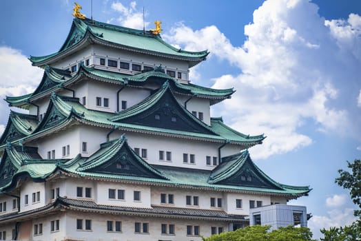 Beautiful japanese castle in winter blue sky