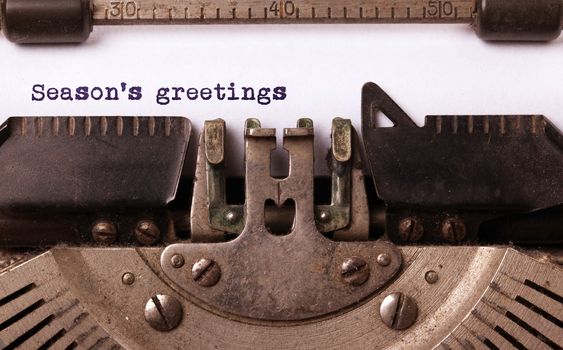 Season's greetings, written on an old typewriter, vintage