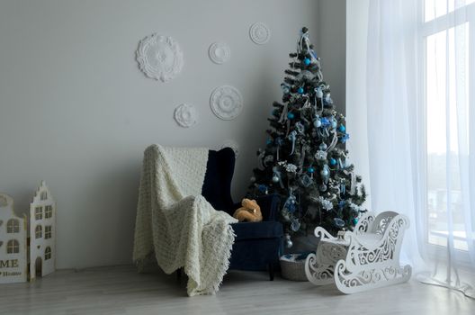 New Year's holiday or celebration, the mood, Stylish Christmas minimalistic interior, christmas tree.New year and winter concept.