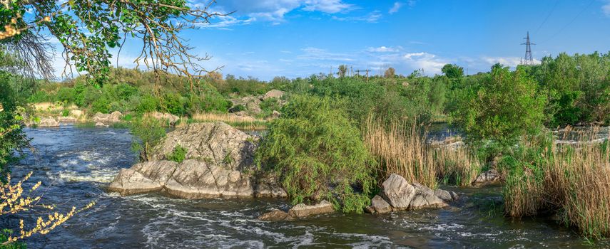 Southern Bug river in Mygiya village, Ukraine, on a sunny summer day