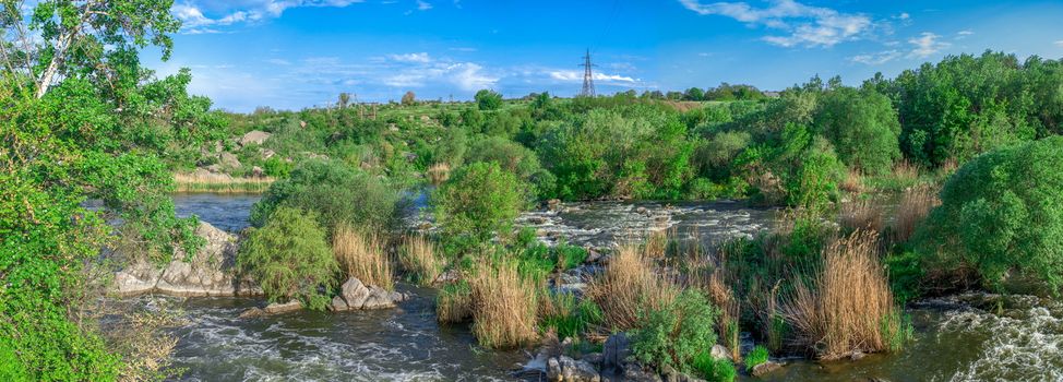 Southern Bug river in Mygiya village, Ukraine, on a sunny summer day