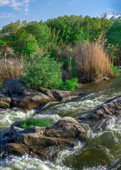 Southern Bug river in Mygiya village, Ukraine, on a sunny summer day