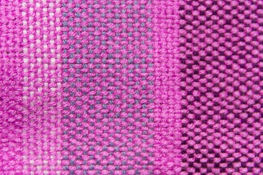 colorful background texture of weaving on loom