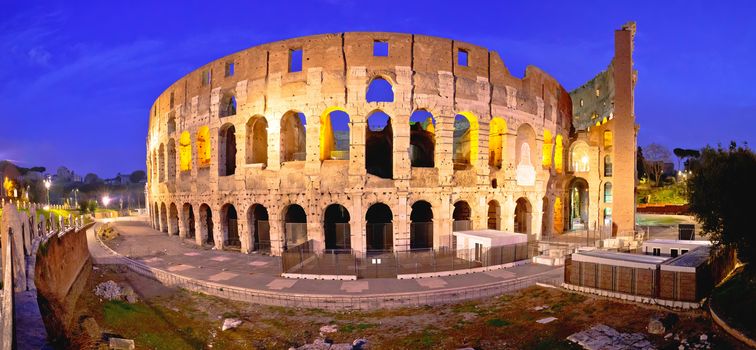 Rome. Colosseum square panoramic evening view in Rome, famous landmarks of capital of Italy