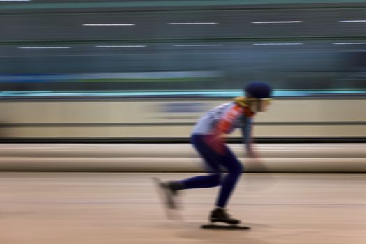 speed of a girl skating indoor during a competition