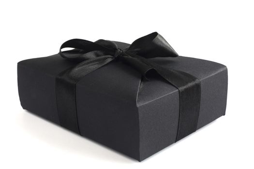 Black friday gift, paper box with silk ribbon bow isolated on white background