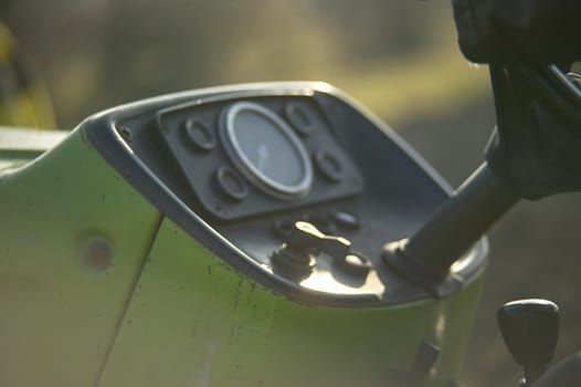 Dashboard of a small tractor for cultivating the earth.