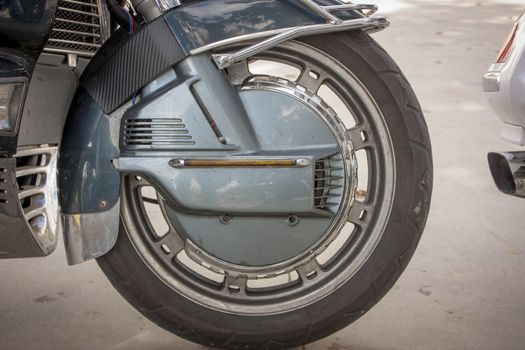 Detail of a front wheel of a road bike or travel by road tire.