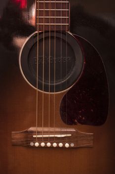 Detail of the central part of an acoustic guitar.