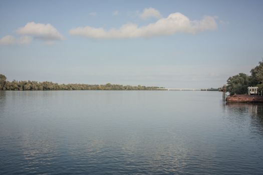 View of the Po river in Italy with the natural vegetation on the horizon
