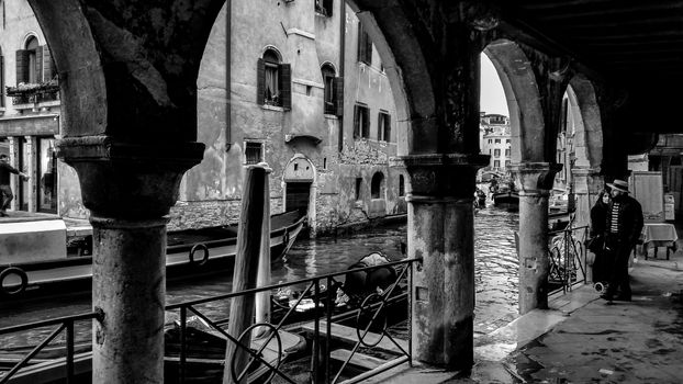 Venetian black and white image that evokes melancholy and nostalgia.
