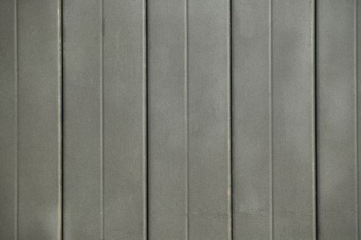 Texture of an iron or metal wall painted in metallic black: ideal image as a background or as texture in graphic projects.