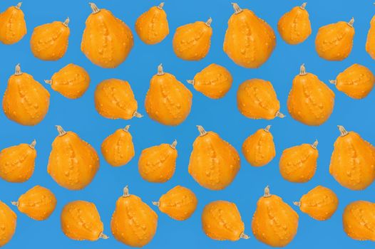Seamless Pattern With Pumpkins On Blue Background
