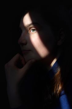 Portrait Of A Beautiful Girl With Sun Rays On Face