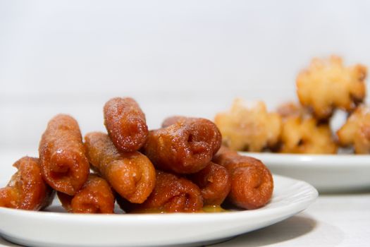 pestiños with port and honey typical of Spanish gastronomy