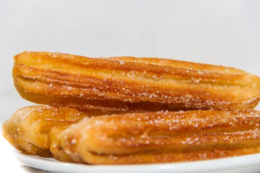 fried churros stuffed typical of Spanish gastronomy